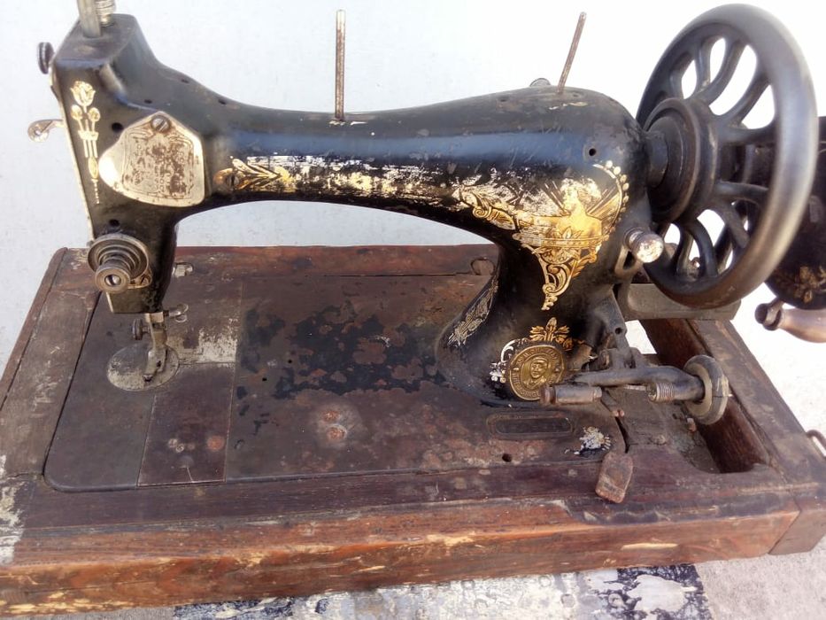 Швейная машина Зингер