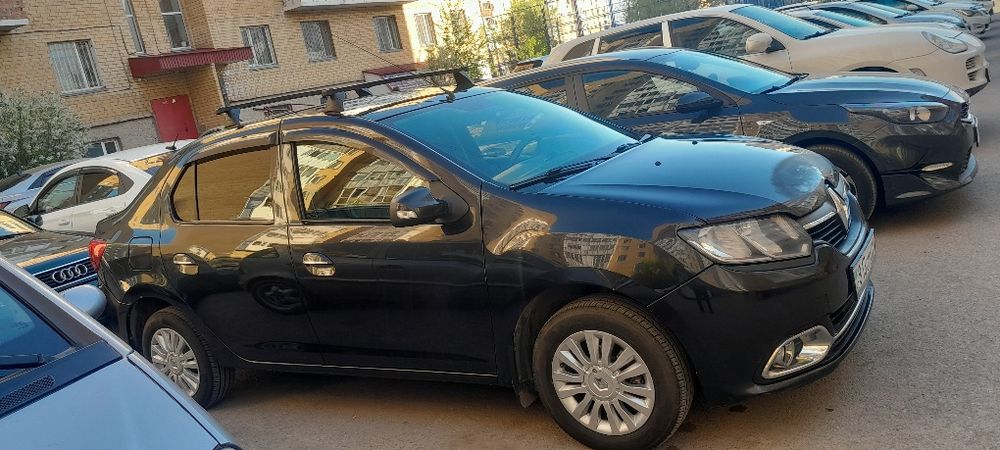 Автомобиль рено логан 2