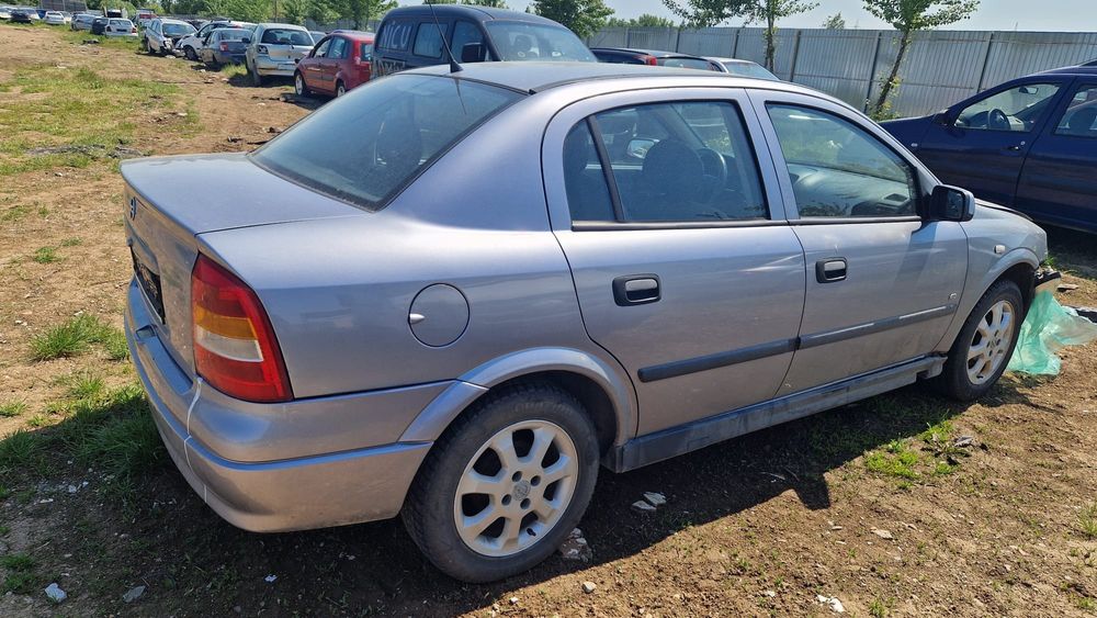 Opel astra G motor cutie viteze 1.6 electromotor usi usa portbagaj hayon roti jante aliaj volan airbag Scaune alternator faruri far pompa servo caseta