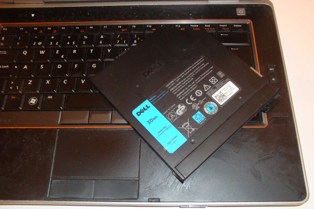 Baterie originala laptop Dell Latitude E6420 pe loc de DVD 30wh P7VRH