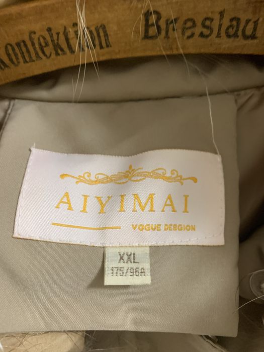 Продам женские пуховики