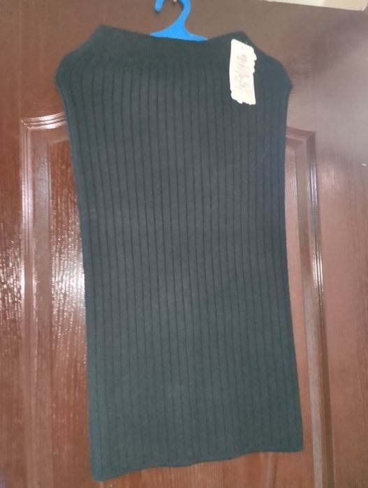 Yubka Xitoy  hali yangi. 46 razmer. Tizzadan sal pasroda turadi.140min