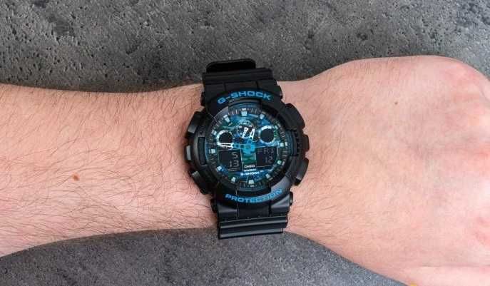 Ceas CASIO G-SHOCK GA-100 BLACK&BLUE-Negru Mat cu Albastru Nou 2026