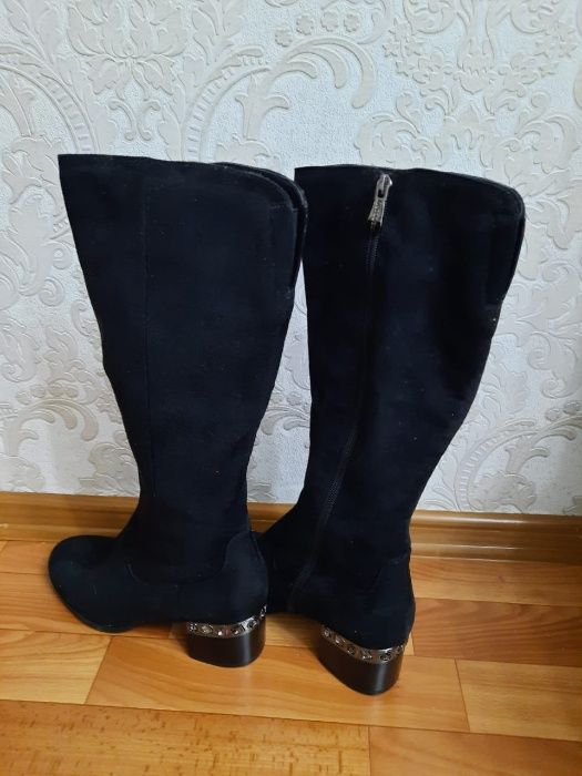 Продам сапоги новые