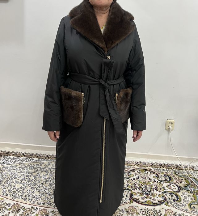 Продам пуховик новый