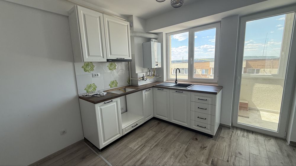 Vand apartament cu loc de parcare in interior, cartoer Fiald