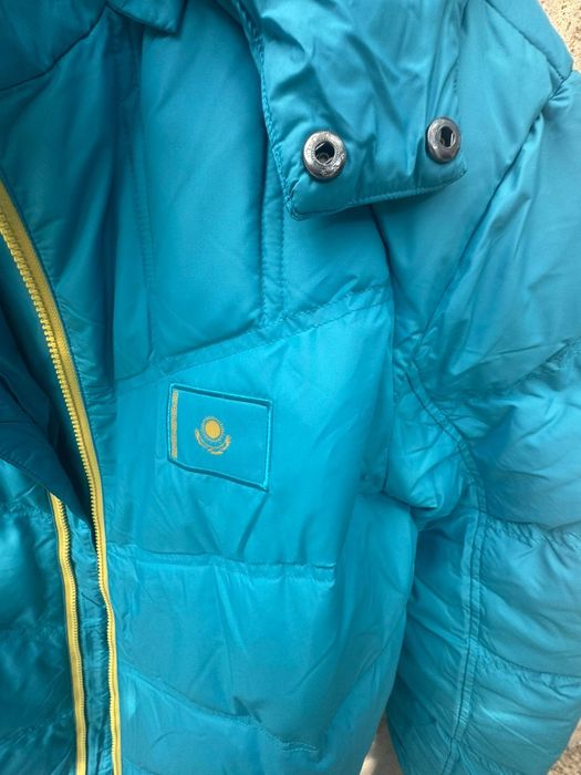 Продам пуховик мужской новый