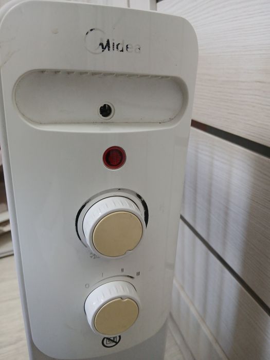 Масляный обогреватель