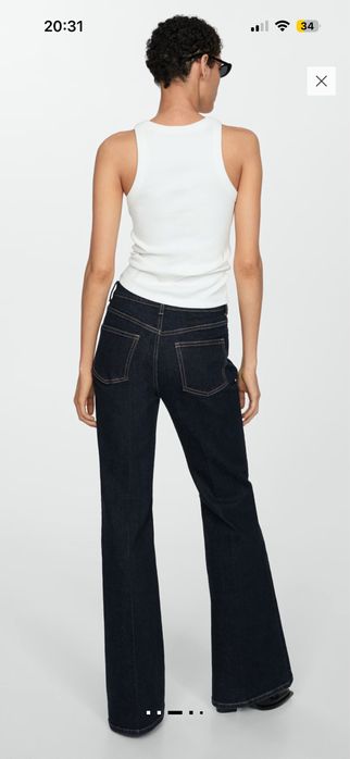 Нави дънки Mango flare и кожен панталон