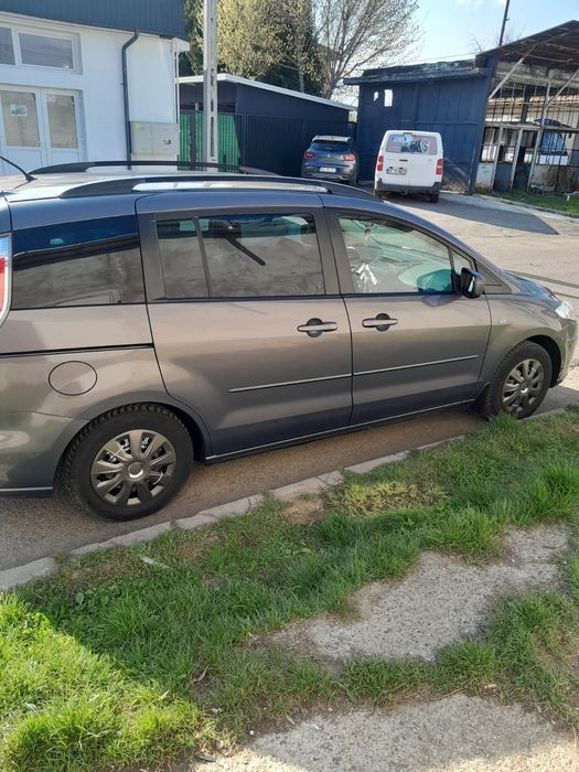 Vând  mazda 5  benzină