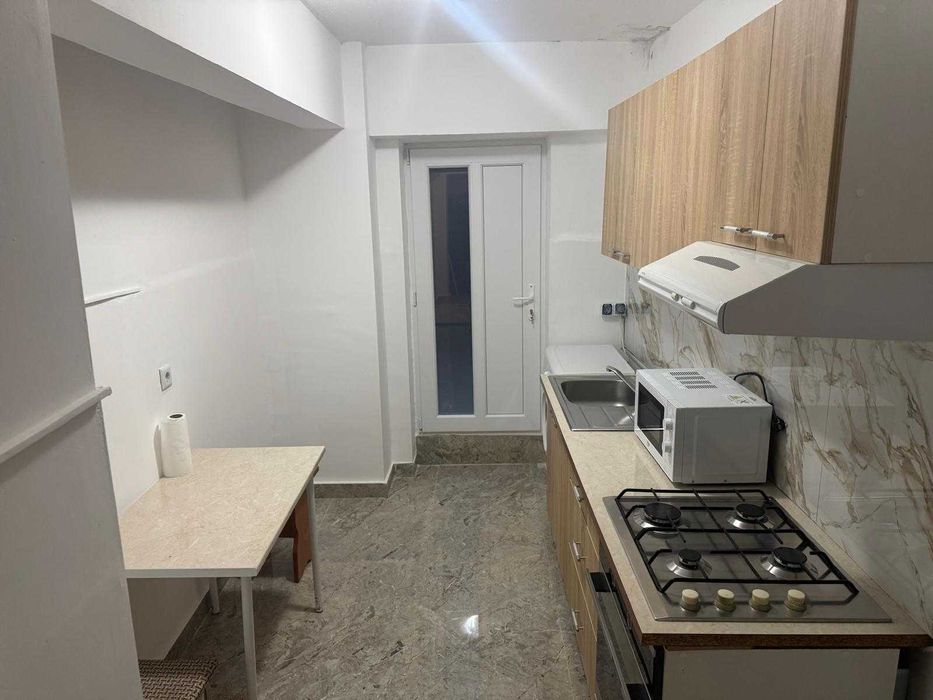 Apartament de inchiriat piata centrala etaj 1 renovat si utilat