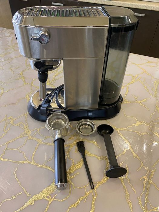 Продам кофемашина Delonghi