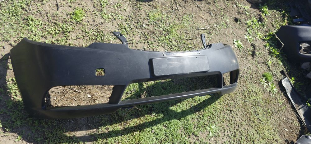 Передний бампер Kia Cerato