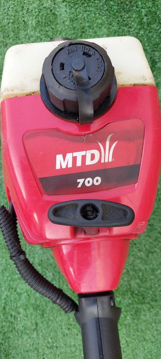 Бензинов тример .