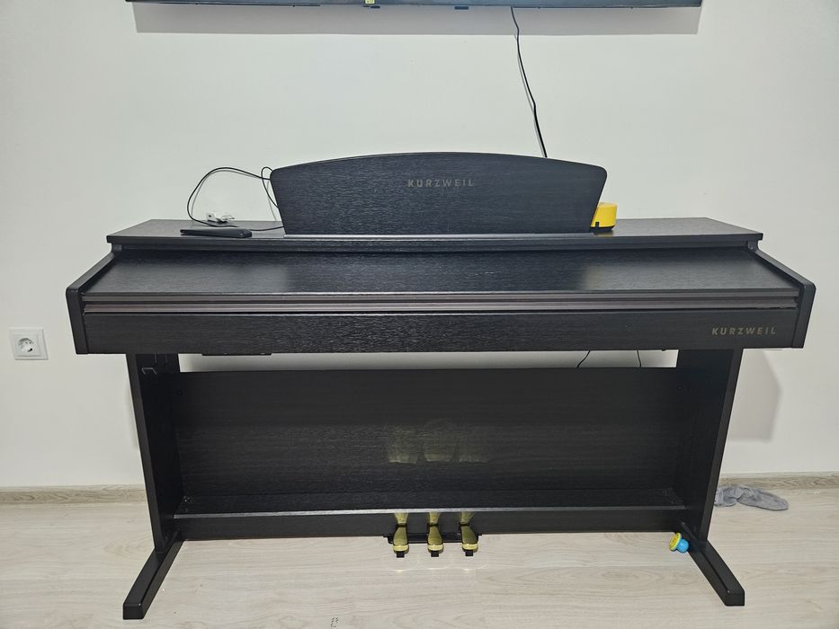 Продам электронное фортепиано марки  KURZWEIL  в отличном состоянии