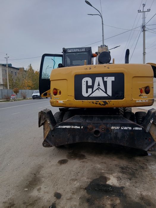 CAT M313D экскаватор сотилади