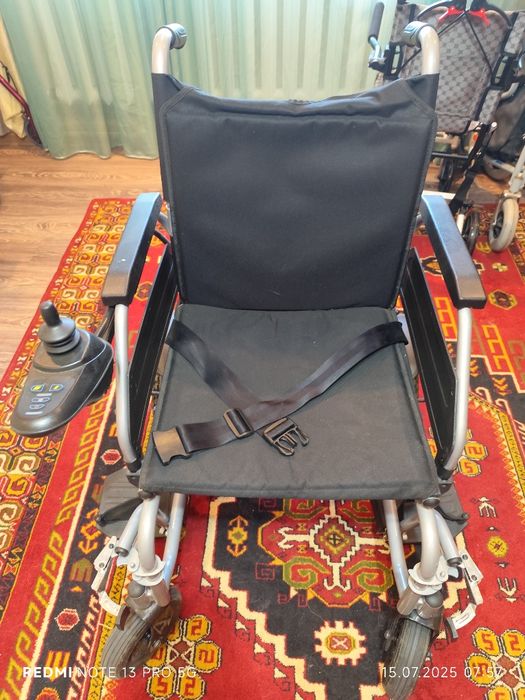 Инвалидная коляска с электроприводом