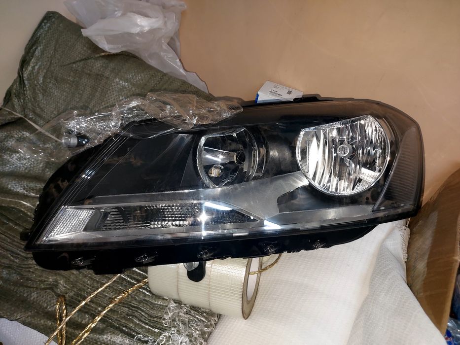 Фара левая passat b7 европеец