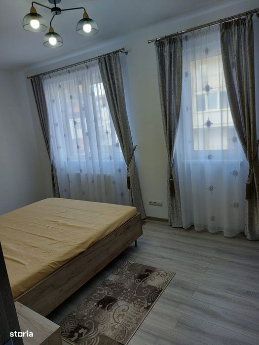 Apartament cu 3 camere,etaj intermediar,parcare subterana,zona Eroilo — fotografia 3