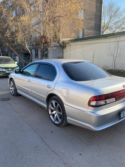 Задний бампер Спойлер Nissan Cefiro a32