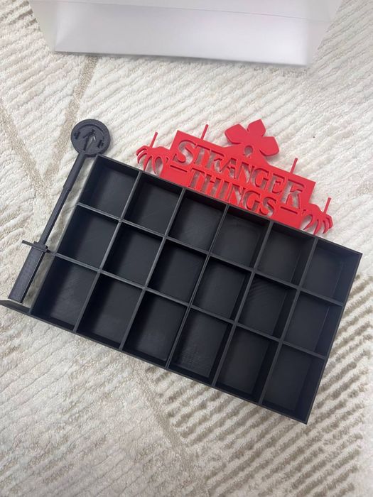 Стеллаж Очень странные дела киндер джой