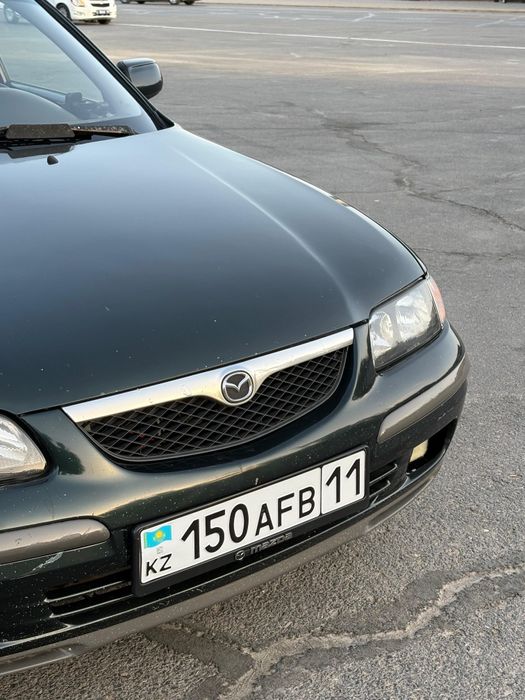 Мазда 626 птичка