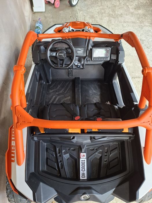 Masinuta UTV electric Premier 4x4 Can-Am Maverick Power RC, 2 locuri, 2 baterii 24V, roti cauciuc EVA, scaun piele ecologica, portocaliu