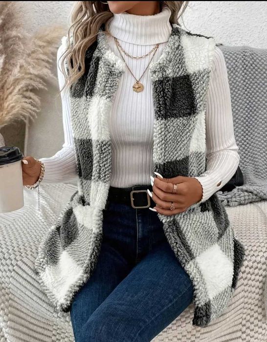 Елегантен дамски пухен елек