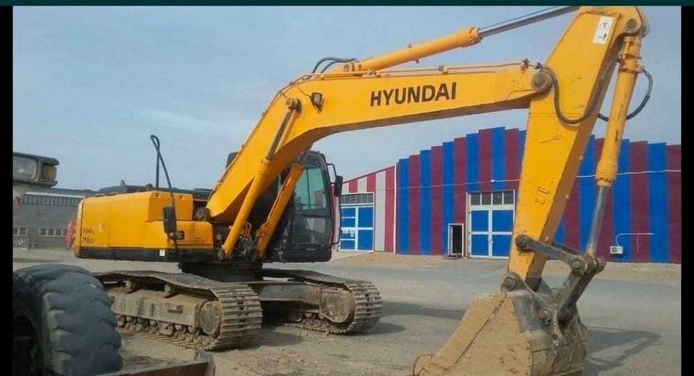 Услуги гусеничного эксковатора