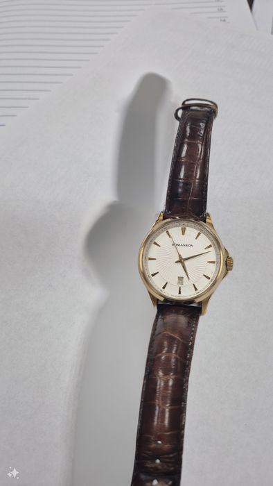 Продам часы Романсон  состояние хорошее