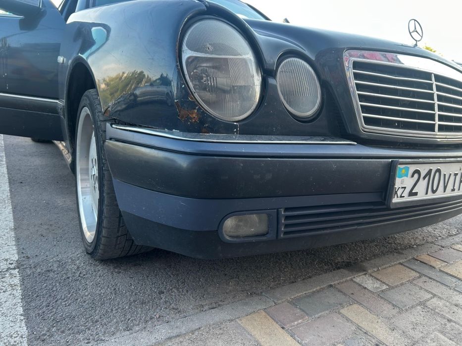 Передний бампер в сборе  Mercedes w210 до рест