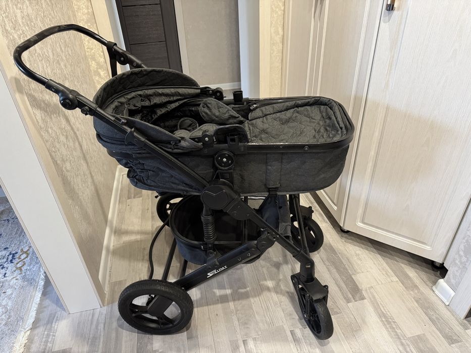 Продам коляску б/у в комплекте с сумочкой