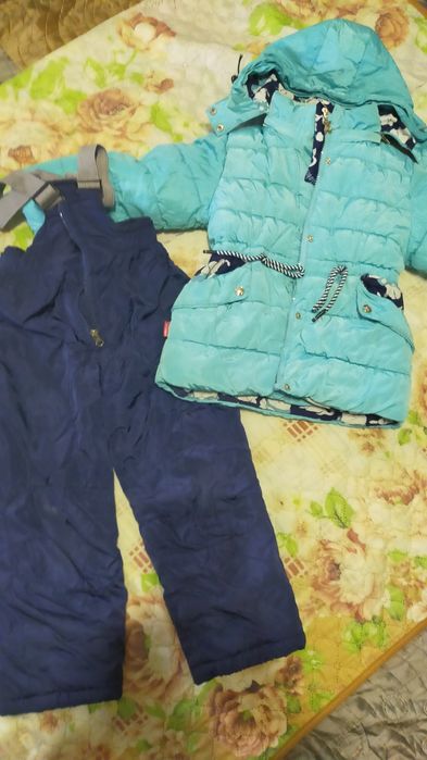 Продам комбинезоны на девочку и мальчика