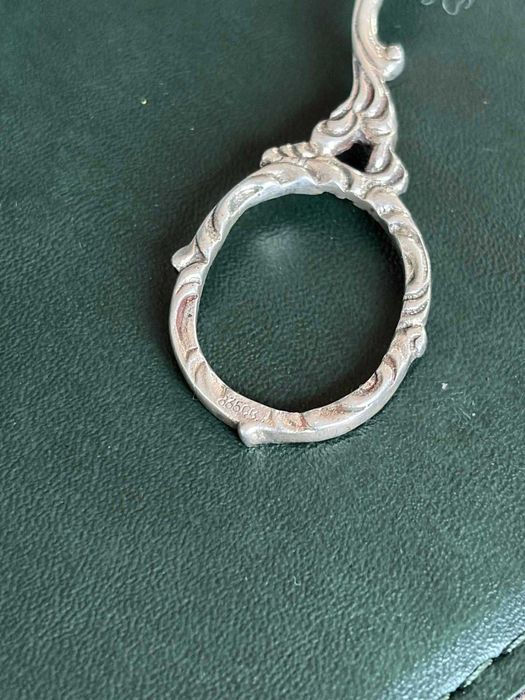 Clește vechi din argint,