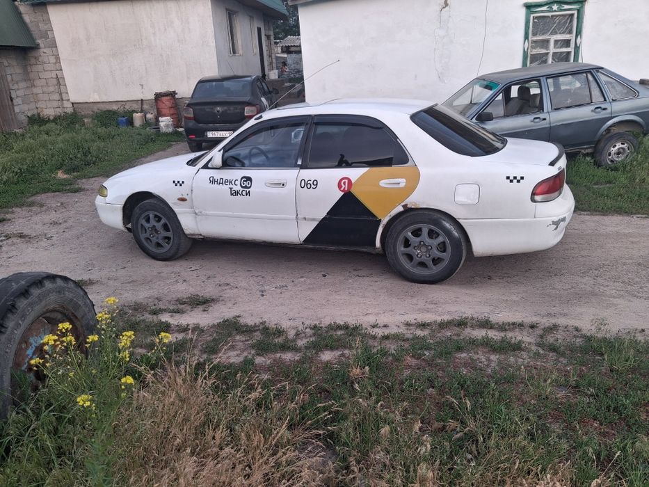 Машина мазда кронос
