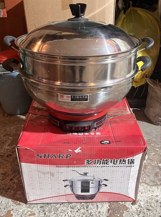 Продам Электрическую кострюлю.
