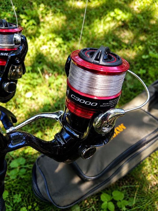 Set 2 lansete feeder Baracuda Opium X Feeder 3303 + mulinete + husa
