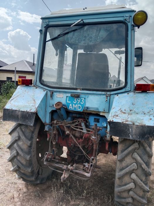 Трактор с прессом