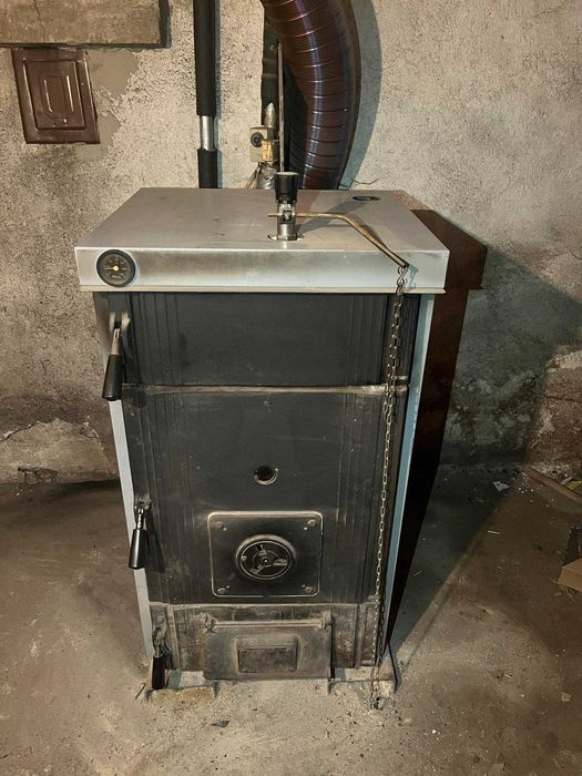 Котел на твърдо гориво с възможност за инсталиране горелка за пелети