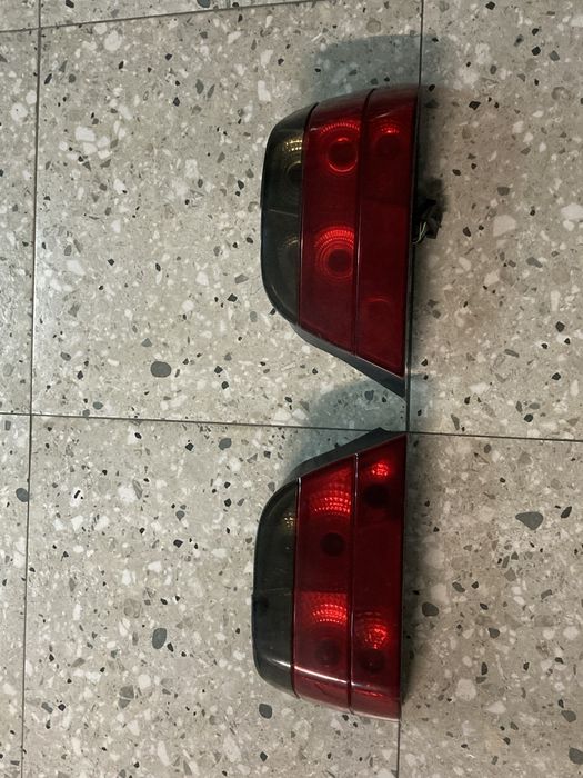 Задние фонари е38