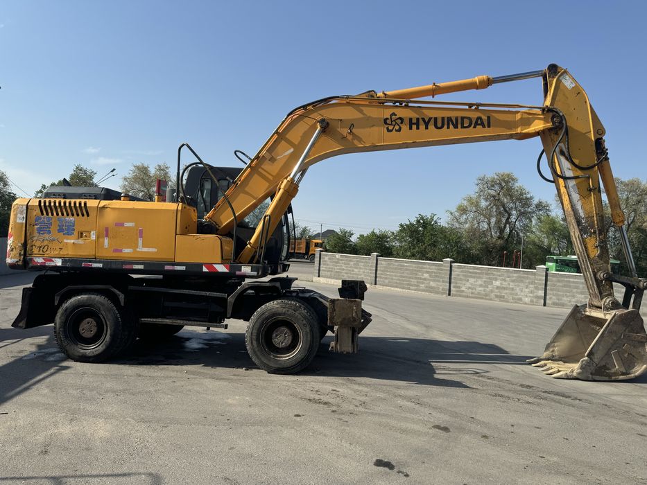 Услуга эксковатора колёсный 210W