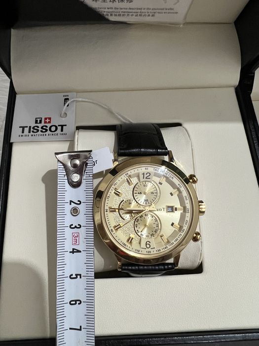 Золотые мужские часы