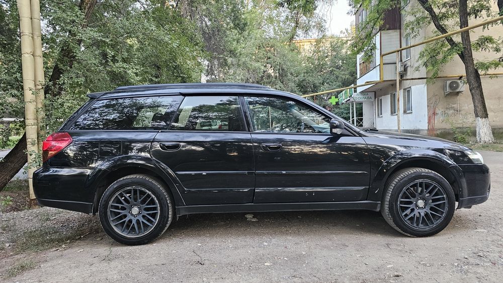 Subaru outback 2005 год 2.5 л