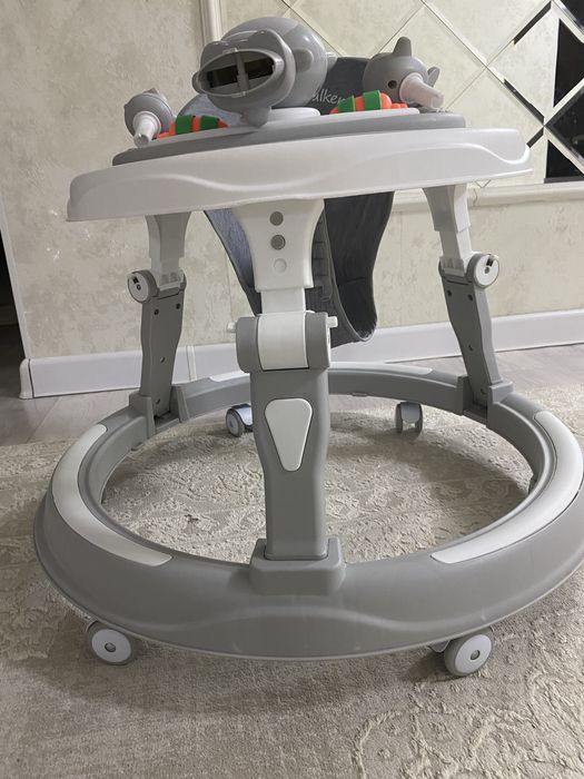 Продам Ходунок серый детский