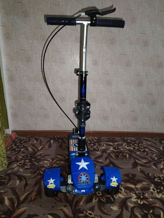 Самокат от 3-9 лет.грузоподьемность 60кг