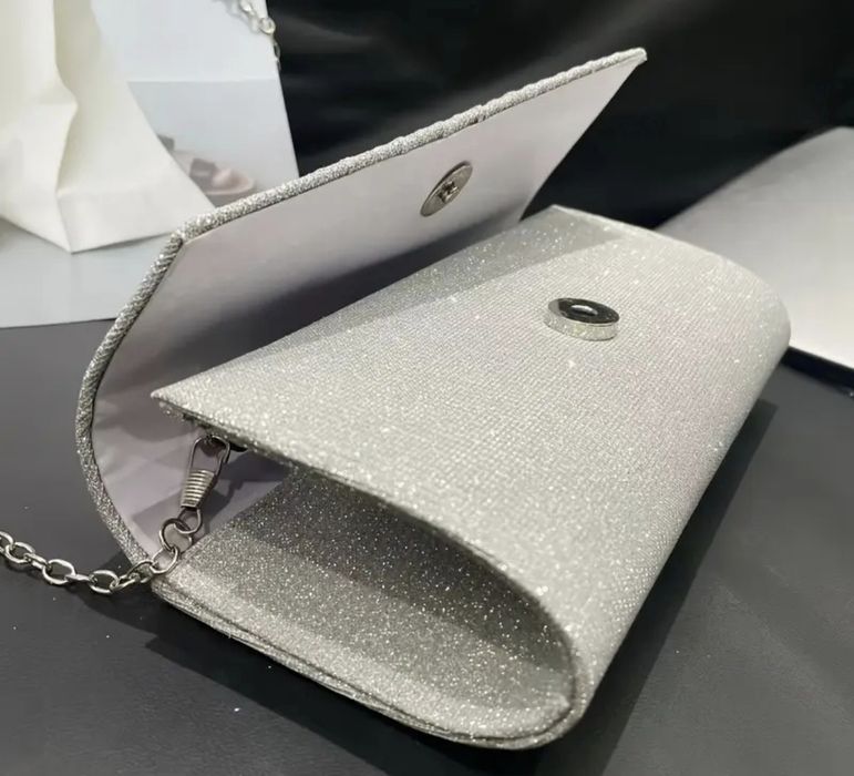 Продам женский клатч в сером и черном цвете