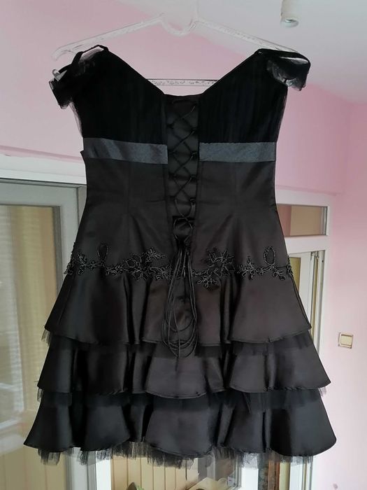 дизайнерска рокля