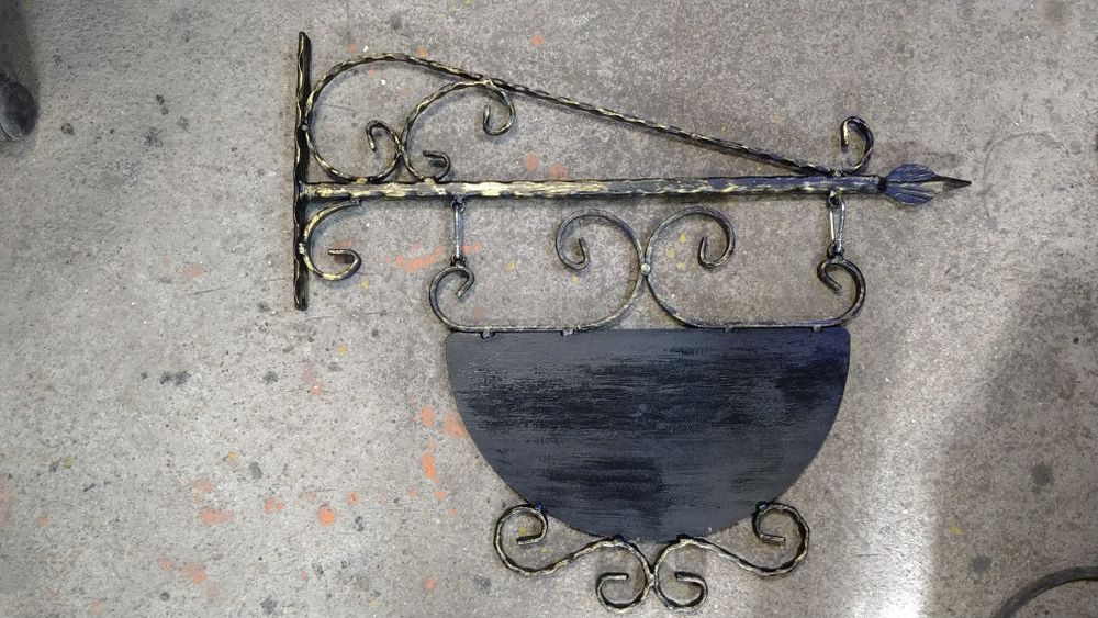 Рекламна табела от ковано желязо