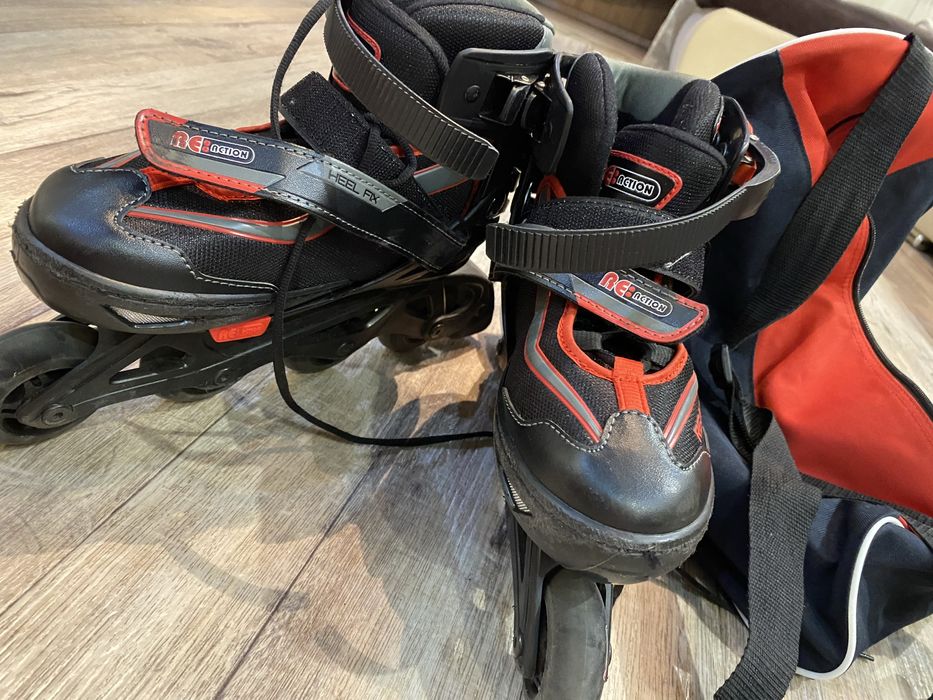 Роликовые коньки