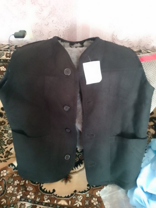 Продам жилет меховой.